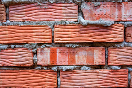 Closeup red brick wall backgroundの写真素材