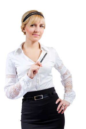 Young beautiful businesswoman with pen in black skirt isolated on white backgroundの写真素材