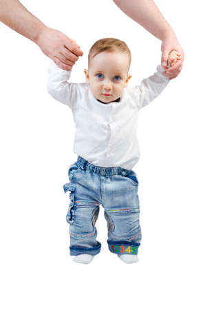 Mens hands hold the baby and help him go isolated on white backgroundの写真素材
