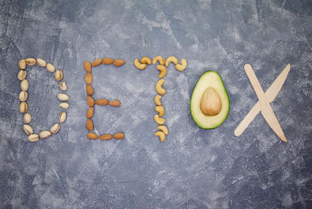 Word detox made from nuts and avocado. Ingredients for smoothies. Concept of diet, cleansing the...