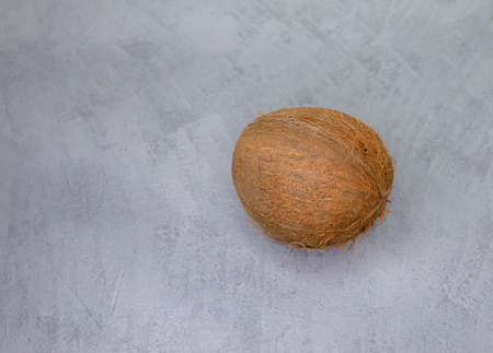 Selective focus of fresh tasty coconut. Tropical fruits. Nut. Top view. Free space for your text....