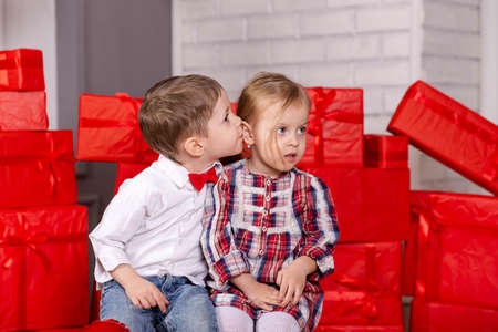 Boy and girl hugging. Two happy caucasian cute funny children kids. Valentine day holiday...