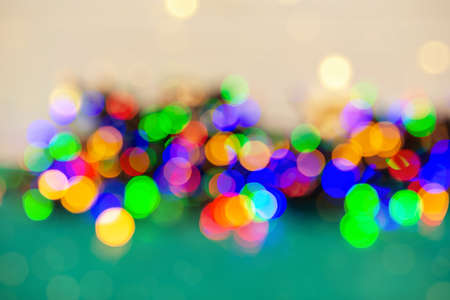 Festive bokeh background. Blurred bokeh light background, Christmas and New Year holidays...