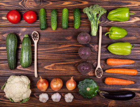 Advertising of healthy natural organic food. Food knolling. Fresh vegetables knolling composition. Flat lay view of different colourful raw vegan food. Healthy vegan food. Top view. Vegetable harvest.の写真素材