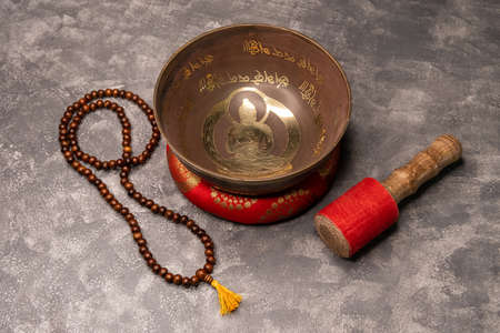 Vintage singing bowls ready for use for healing sound massage. Close up of Tibetan singing bowl....