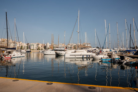 Landscape of the city and the ferry port on the Adriatic sea. Marina with anchored boats.Fishing...
