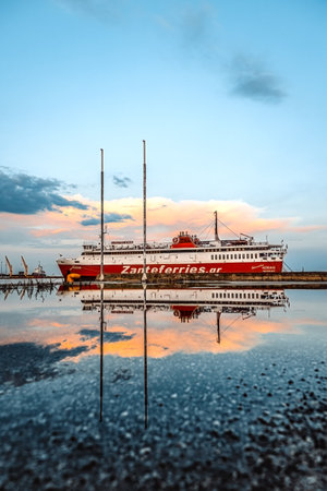 Night view and reflection of Alexandroupolis city sea port capital of Evros region Northern Greece, Eastern Macedonia and Thrace, 3.7.2023, Zanteferries boat.のeditorial素材