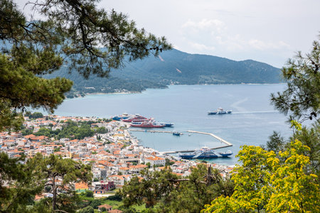 Top panoramic view of Limenas capital city and port of Thasos or Thassos Greek island in the North Aegean Sea, 3.6.23.のeditorial素材