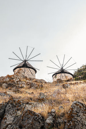 Traditional windmills near to Kontias village Lemnos island Greece Aegean sea, panoramic view.の写真素材