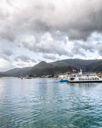 Cruise from Nidri port in Lefkada or Lefkas Greek island, Ionian Sea near Preveza. Summer vacation on boat, cloudy sky.の写真素材