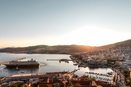 Kavala city Greece, 12.8.24 Panoramic view of from the Byzantine fortress or castle, near Panagia church, sunset colors.の写真素材