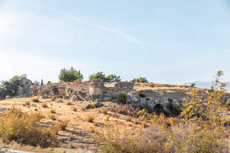 Byzantine stone ruins of the Castle Issari of Sidirokastro near Serres, Macedonia Greece, panoramic view to the city, tourist destination.の写真素材