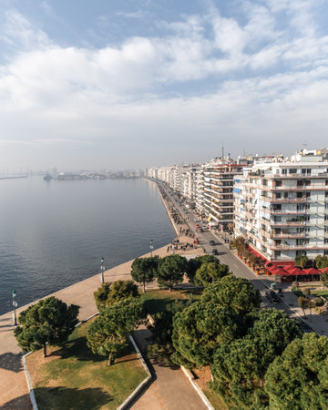 Panoramic view from White Tower monument and museum in Thessaloniki or Saloniki capital of Macedonia Greece, walking pedestrians, major seaport, blue sky.の写真素材