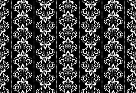 Wallpaper in the style of Baroque. Seamless vector background. White and black floral ornament. Graphic pattern for fabric, wallpaper, packaging. Ornate Damask flower ornamentのイラスト素材