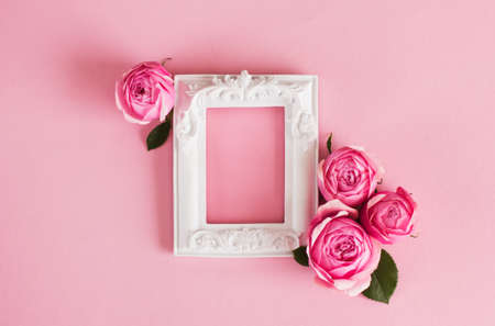 Spring flower arrangement of fresh roses and white text frame. Wedding, Birthday, Mother's Day...