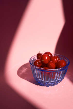 Heap of cherries in the bowlの写真素材