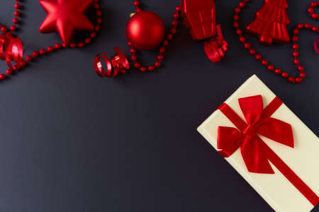 Christmas composition with gold and red decorations.