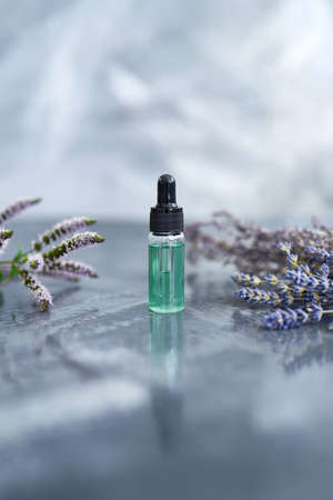 Essential oils on the grey backgroundの写真素材