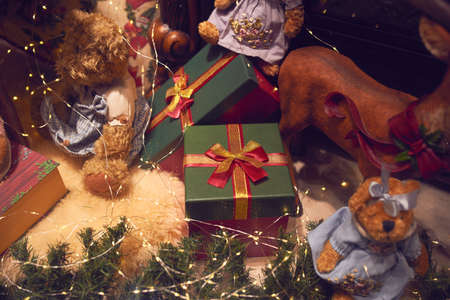 Christmas decorations and present boxes with festive lights