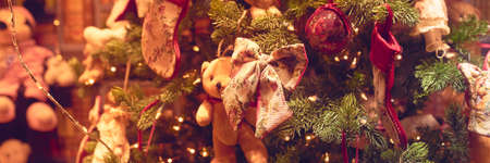 Christmas tree with toys and festive lightsの写真素材