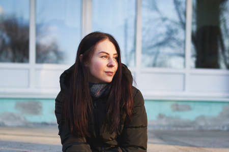 Portrait of young smiling beautiful woman with dark hair