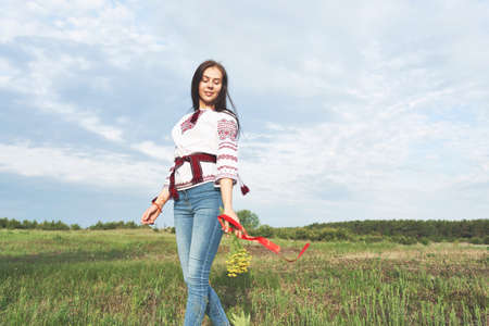 Beautiful caucasian woman in a folk costumeの写真素材