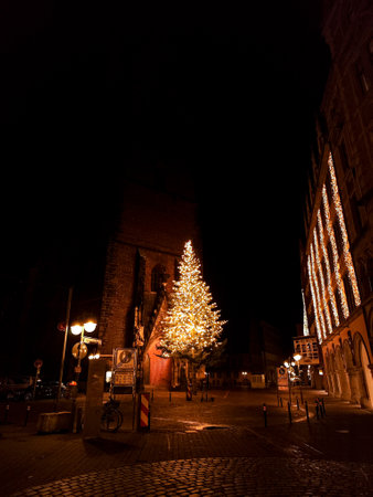 Happy New Year and Christmas concept. Cozy streets with christmas tree and garlandsの写真素材