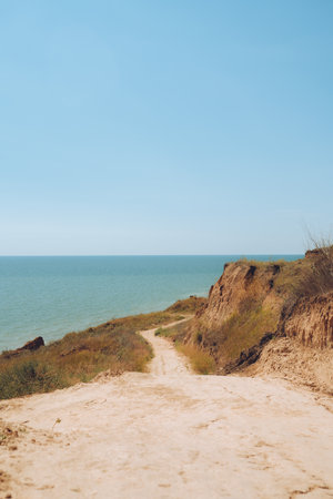 Amazing landscape with sea bay, sand beach and coastal hills and rocks at summer. trip to seaside.