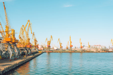 Container cargo ship at industrial port in import export logistic and transportation of international by container cargo ship in the open sea. Odessa, Ukraineの写真素材