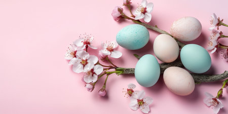 Colorful Easter eggs with spring blossom flowers on pastel background. Colored egg holiday border, flat lay. AI Generativeの素材