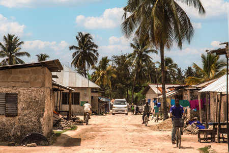 Zanzibar, Tanzania. 27 March 2018. traditional African road through the village and people going about their businessのeditorial素材