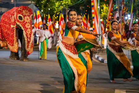 Colombo, Sri Lanka. 06 febfuary 2023. large carnival festive procession with elephants and dancers in bright national costumes through the streets of Colomboのeditorial素材