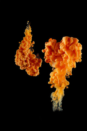 Orange Acrylic colors ink in water isolated Abstract and bright. subject photo, cosmetics, drinks...