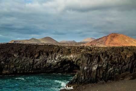 Stunningly beautiful lava caves and cliffs in Los Hervideros after sunset Lanzarote Canary Islands Spain. Travel conceptの写真素材