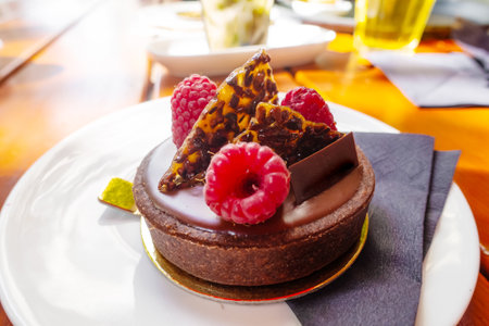 beautiful variety of pastries from the pastry shop served on a round trayの写真素材