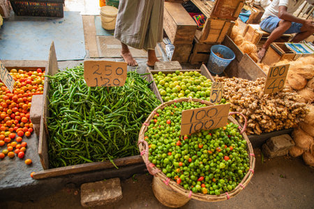 variety of vegetables, fruits, cereals and dried fish at the central market in the capital of Sri Lankaの写真素材