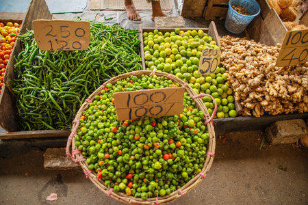 variety of vegetables, fruits, cereals and dried fish at the central market in the capital of Sri Lankaの写真素材