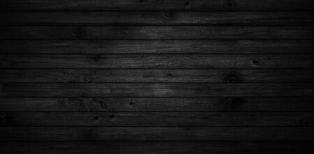black wood texture with natural patterns backgroundの写真素材