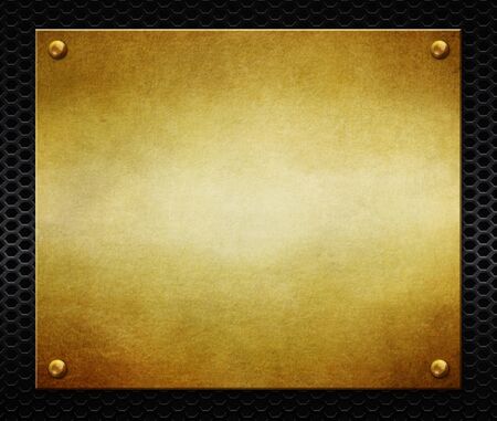 Golden metal plate with rivets on a black background. Metal texture for design.3d illustration.の写真素材
