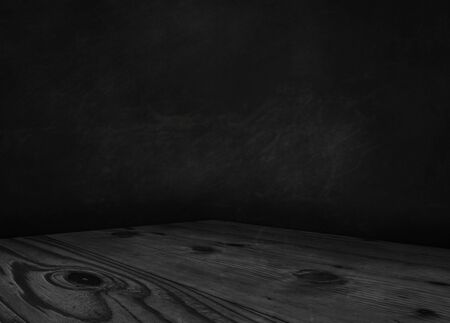 Wooden table on dark background with space for your text. 3d illustrationの写真素材