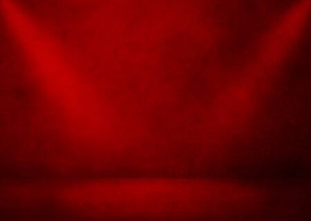 Red room background. Studio template. Grunge red interior with lightingの写真素材