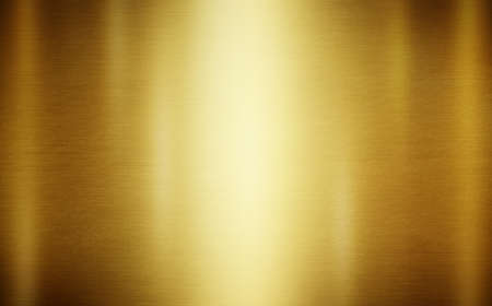 Gold polished metal texture or abstract stainless steel background.の写真素材