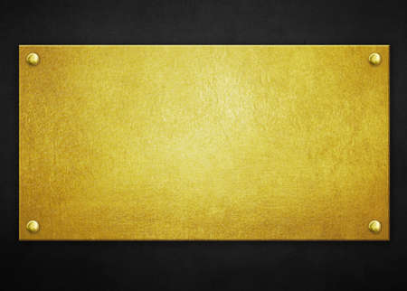 Gold or brass sign metal plate on black background. 3d illustrationの写真素材