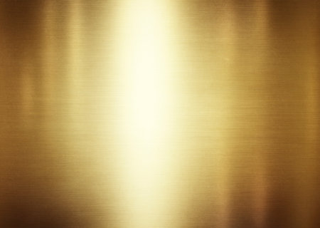 Gold metal background or texture. Yellow steel plate.の写真素材
