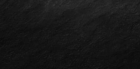 Black wall rough dark texture or old grunge backgroundの写真素材