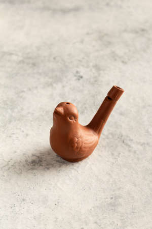 Whistle bird on a gray backgroundの写真素材