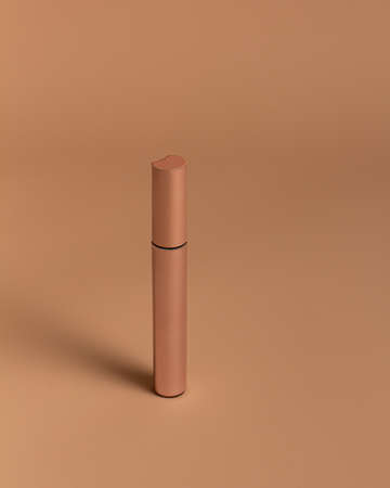 mock-up packaging of mascara on a powdery background. Verticalの写真素材