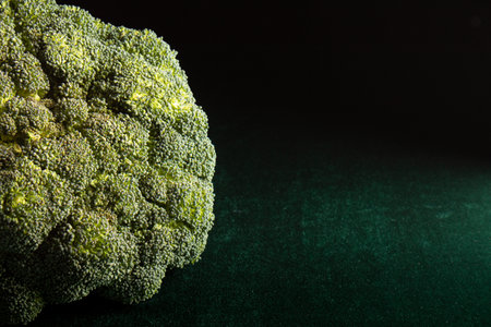 fresh broccoli on a green suede backgroundの写真素材