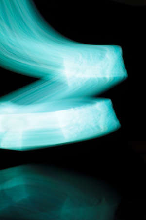 Aqua color flow on a black background