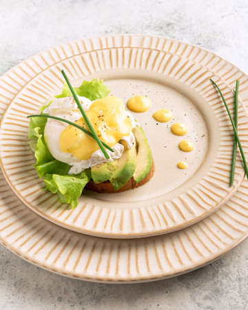 egg benedict on a plate, plating, close-upの写真素材
